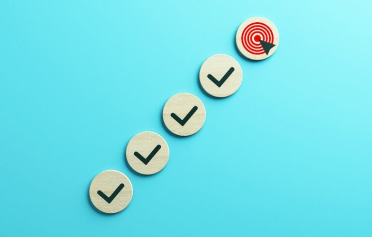 Steps to success concept with check marks leading to a target. 3D Rendering