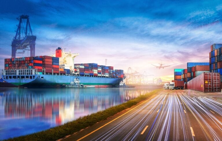 Logistics and transportation of International Container Cargo ship and cargo plane in the ocean at twilight sky