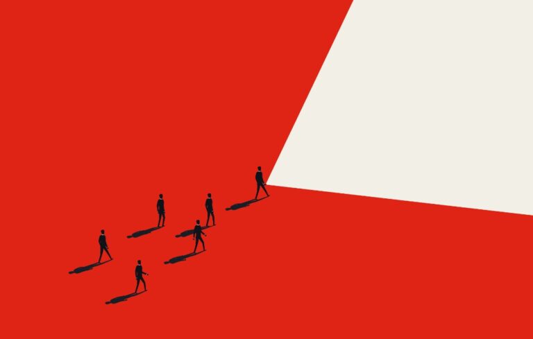 Business leader and leadership concept with businessman and flashlight